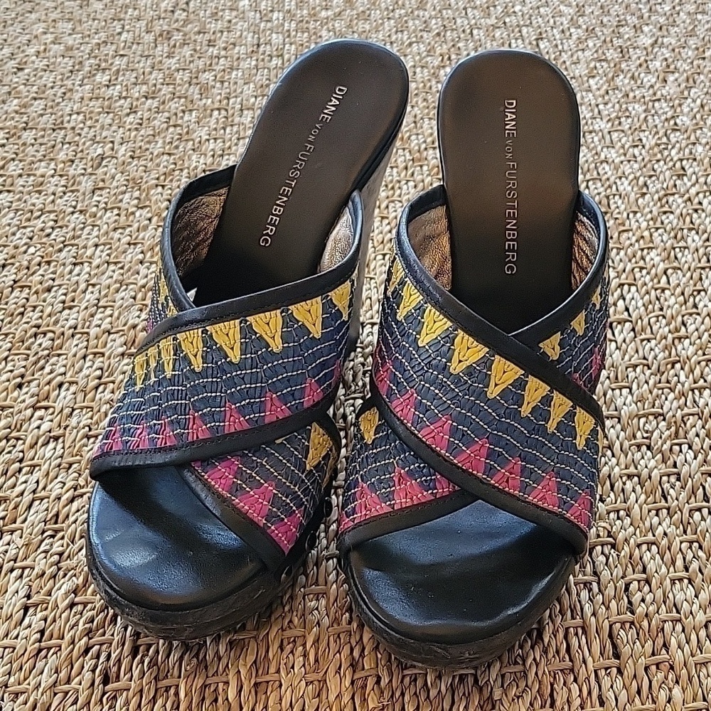 Diane Von Furstenberg wedge sandals.  Textile strap, wood heel.